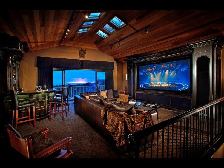 cool media room with wooden ceiling