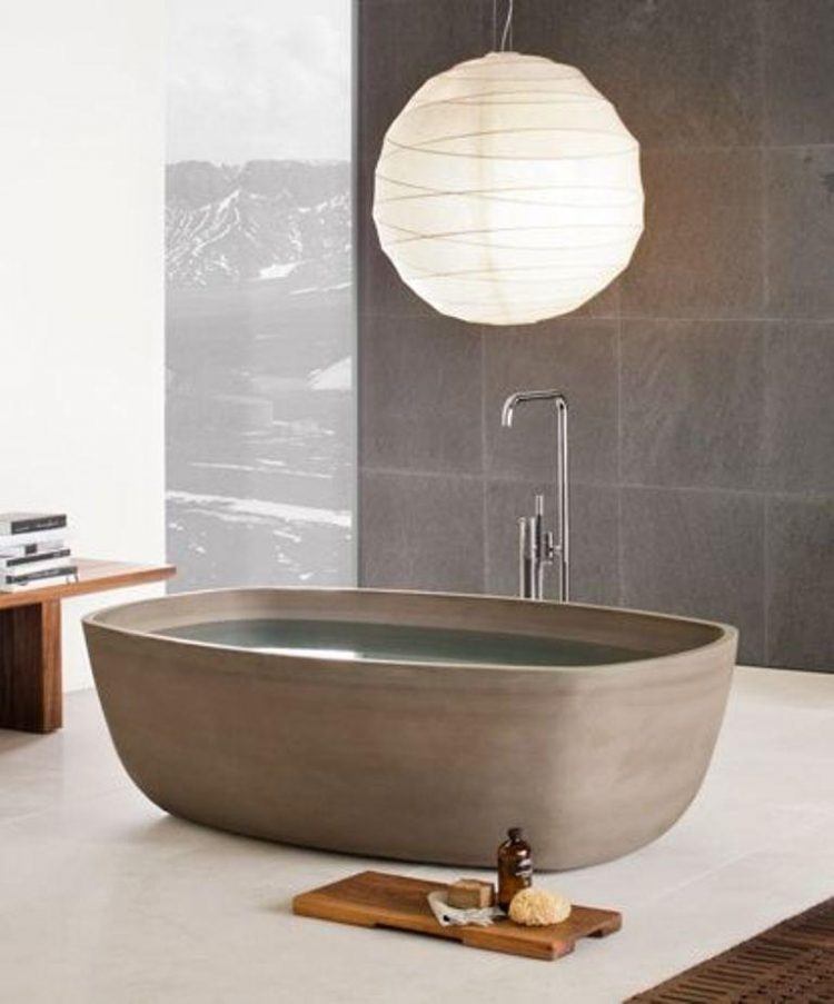 zen bathroom with stone tub