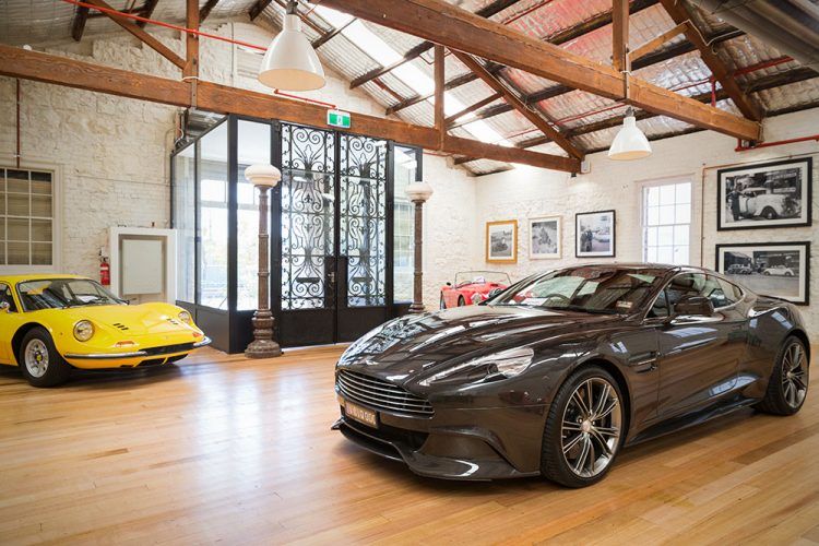 beautiful garage with wood flooring