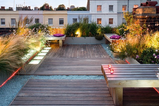 simple rooftop garden with wood and stone floor