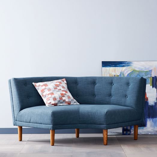 small blue curved couch