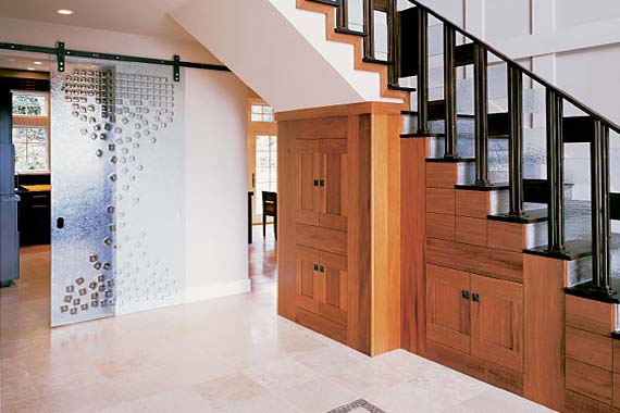 classic wooden storage under stairs