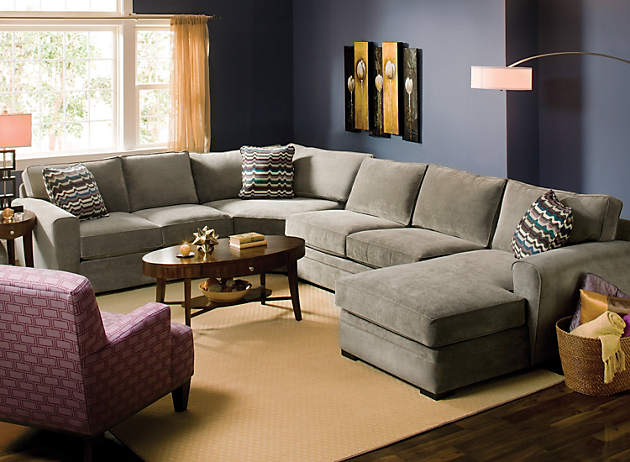 living room with large sectional sofa