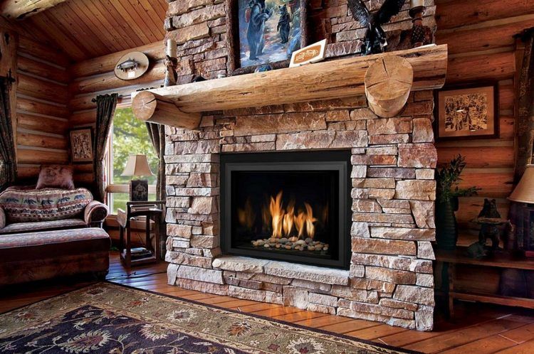 large fireplace with log mantel