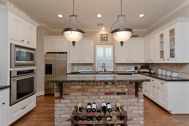 modern kitchen with two hanging lamps