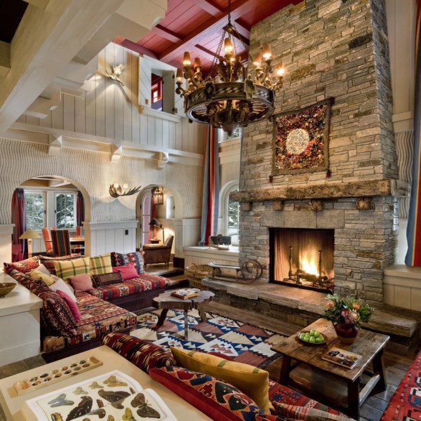 cabin style living room with chandelier