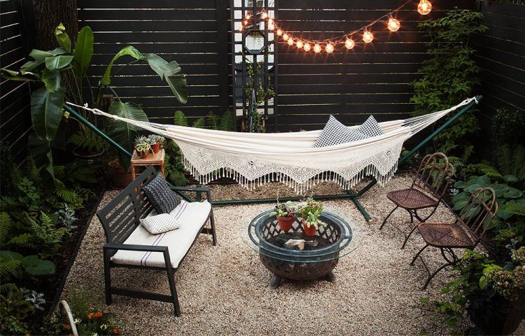 calming backyard area with hanging lights