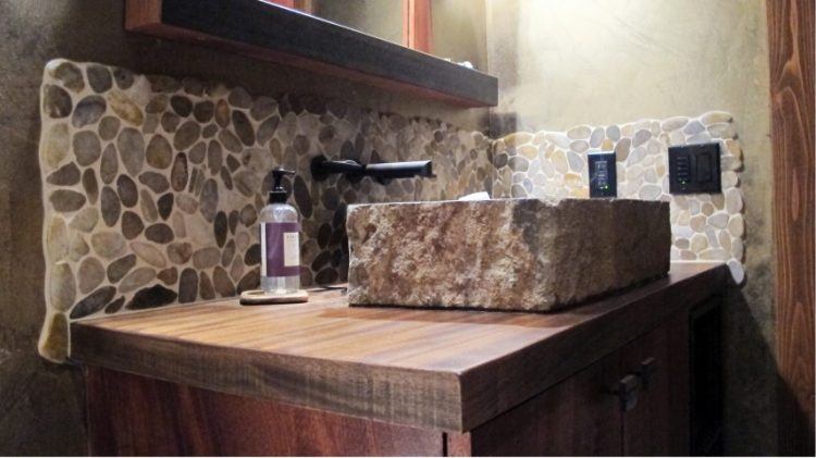 bathroom with square stone sink