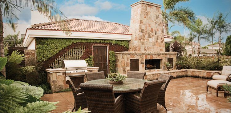 beautiful backyard patio area with fireplace