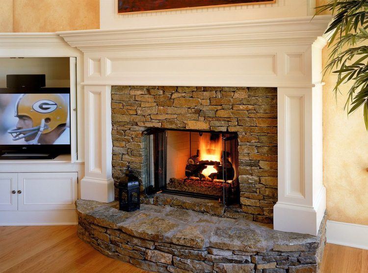 brick fireplace with white mantel