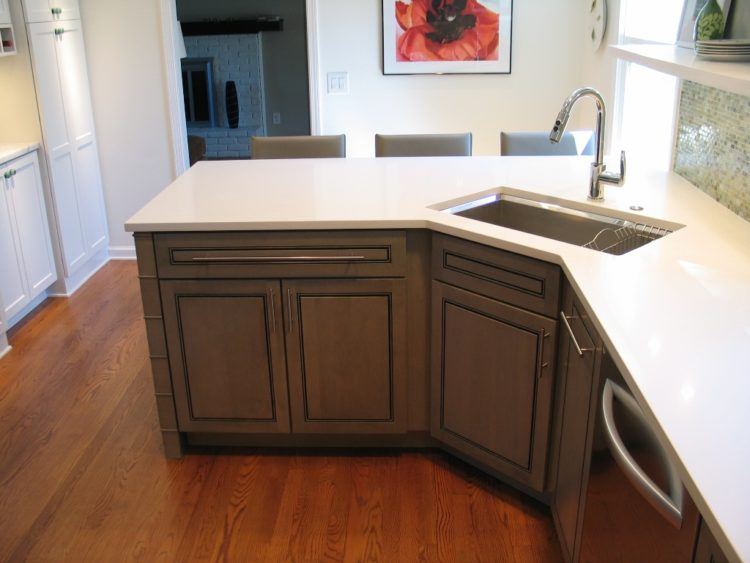 beautiful kitchen corner sink with wooden cabinets