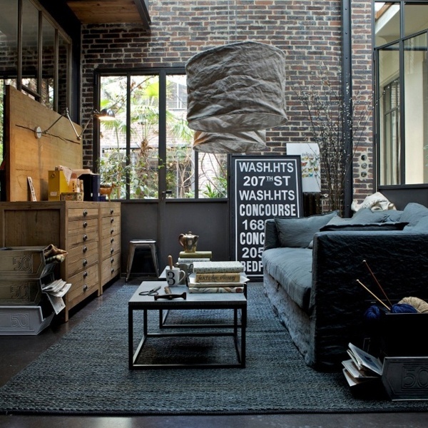 living room with cool hanging lamp