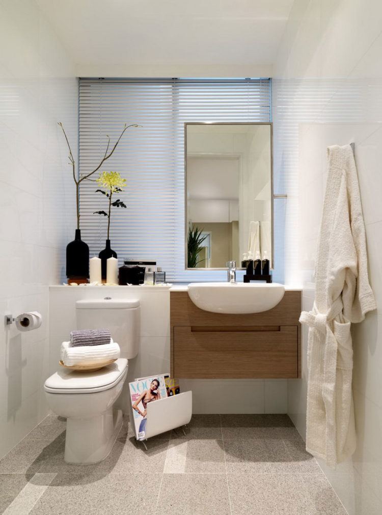 bathroom with large vanity mirror