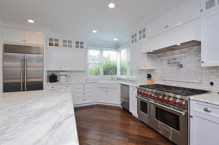 kitchen with wood floor and stainless steel appliances