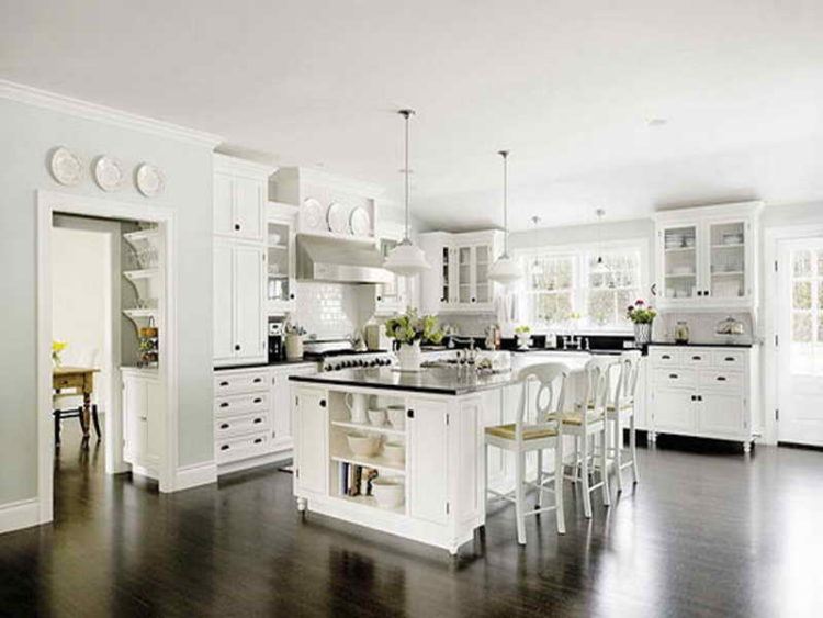 white kitchen with dark wood floors