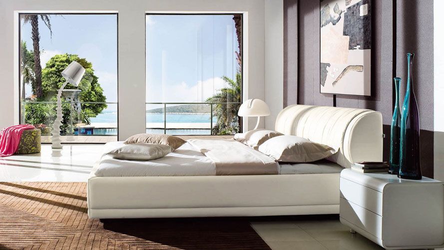 beautiful bedroom with ocean view