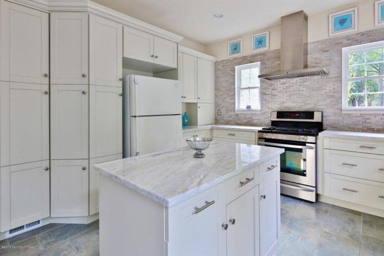 cottage kitchen with mosaic tile