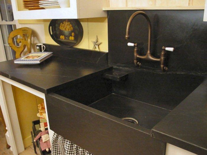 large kitchen sink made of stone