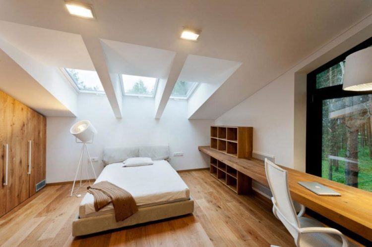 master bedroom in wood and glass house