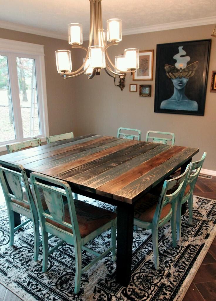 rustic table with blue chairs