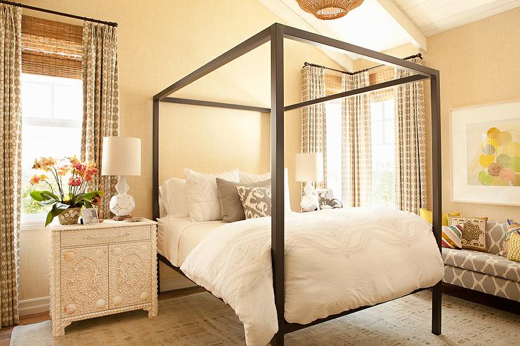 bedroom with canopy bed and skylight