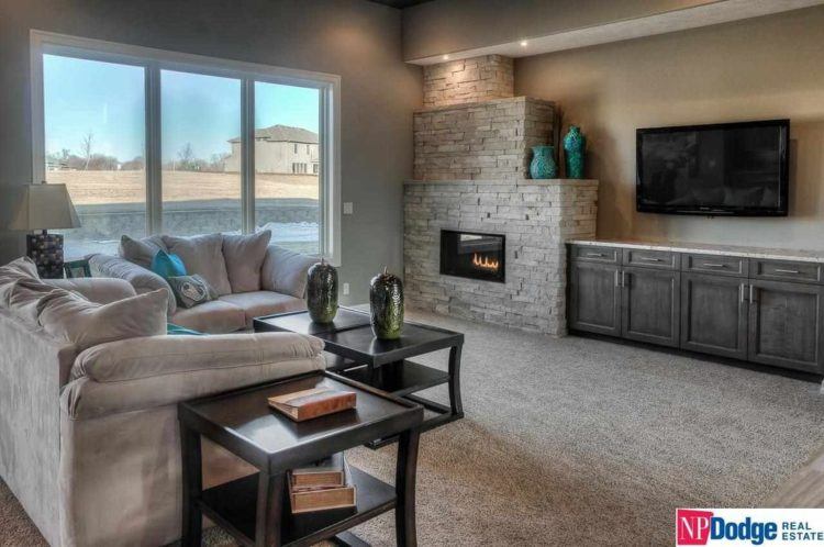 contemporary living room with corner fireplace