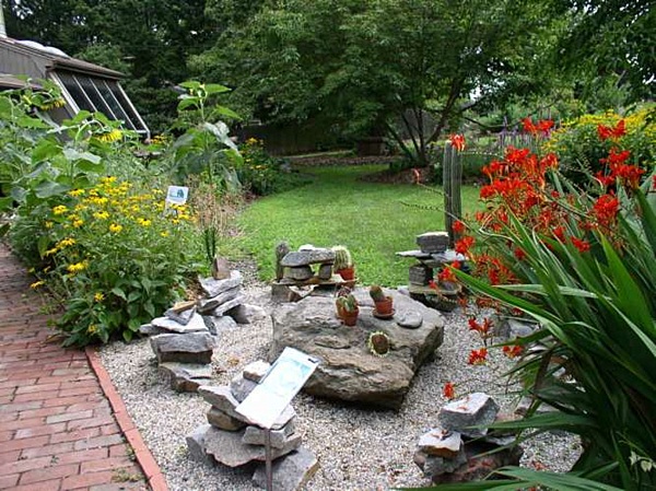 beautiful backyard sitting area with rock table