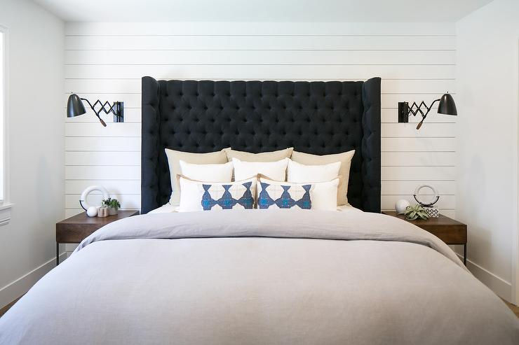 beautiful bedroom with white shiplap walls