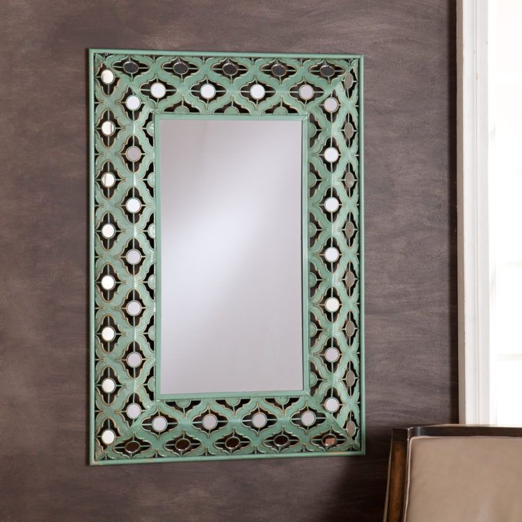 beautiful decorative mirror with green framing