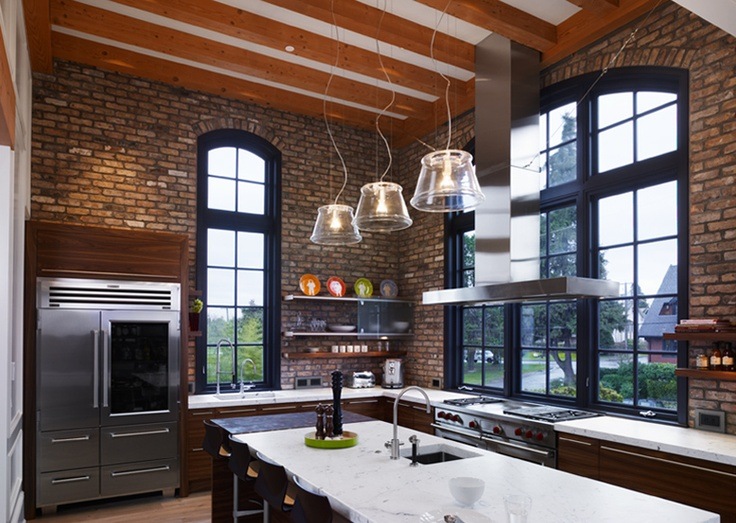 stylish kitchen with brick walls