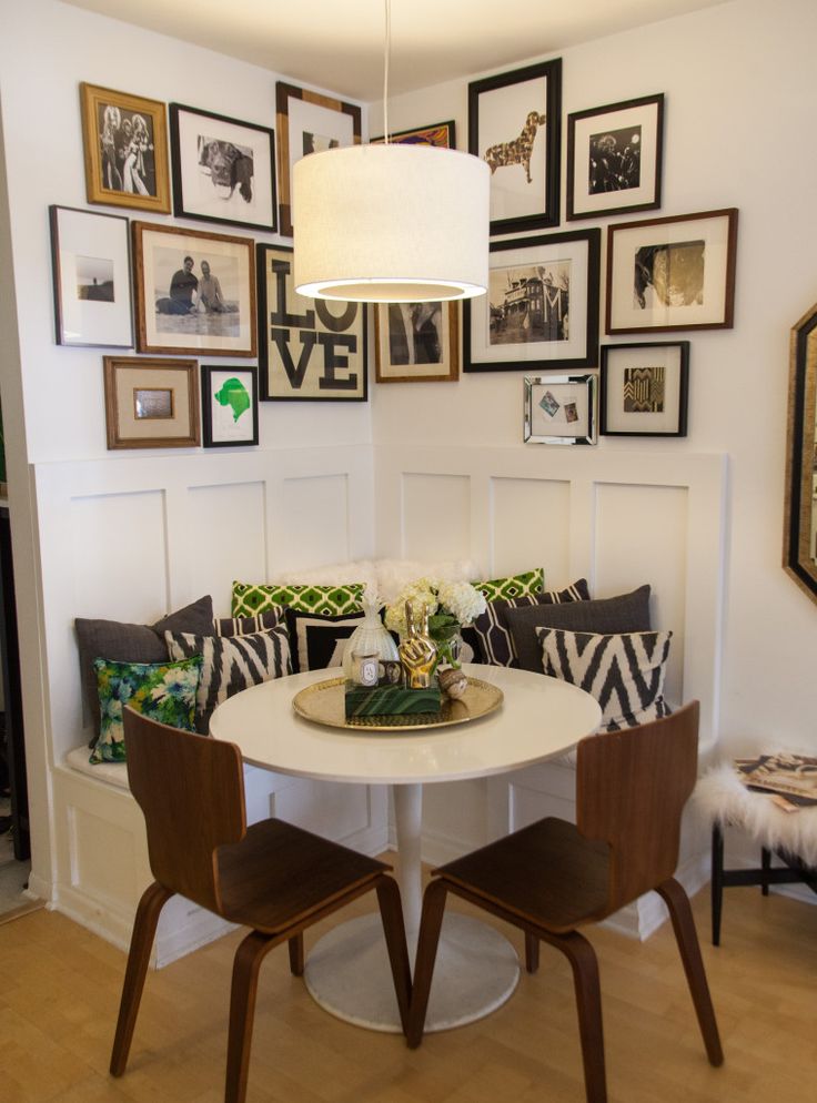 small dining area with gallery wall