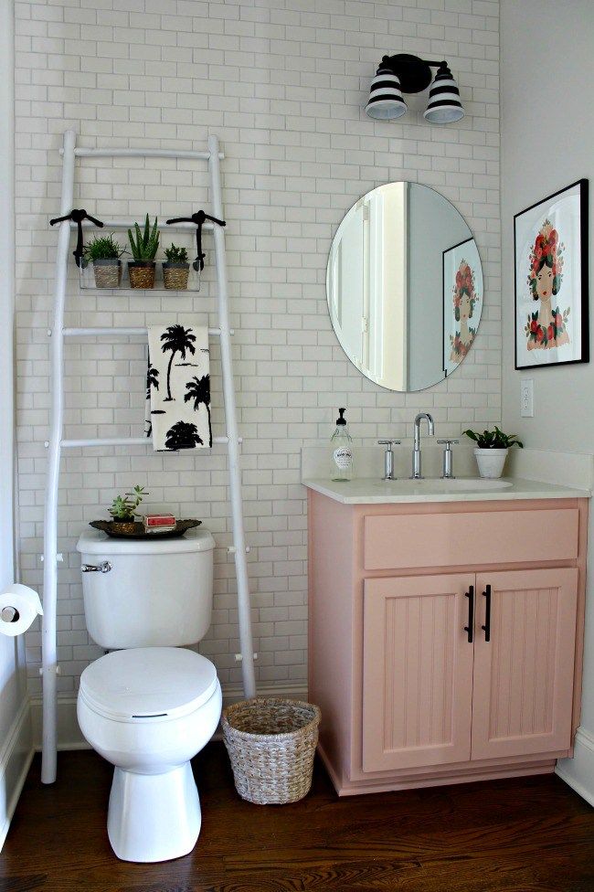 small bathroom with pink vanity