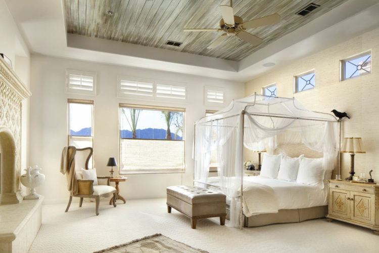 bedroom with wooden ceiling and ceiling fan