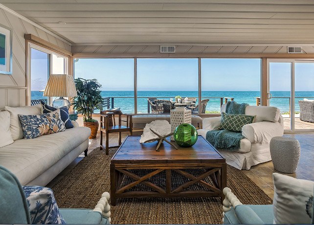 beautiful living room with waterfront view