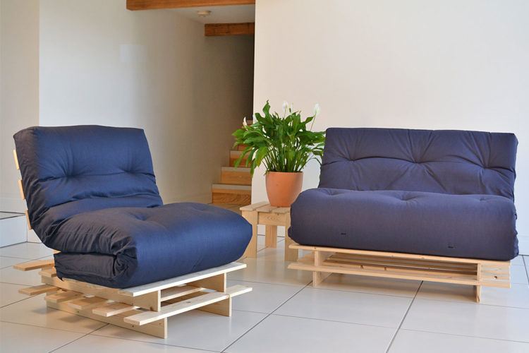 small blue futon with wood frame