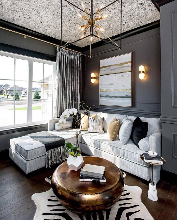 formal living room with hanging lamp