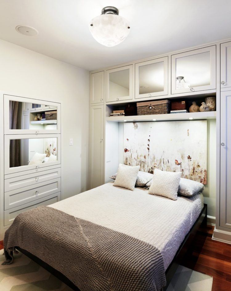 engaging small bedroom with mirrors