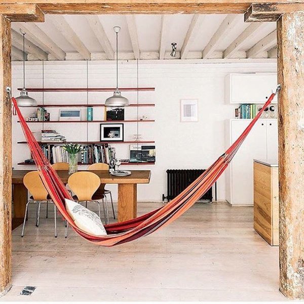 hammock attached to pole in house