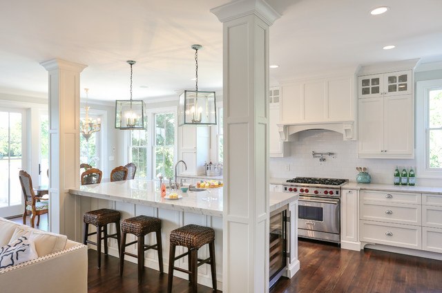 traditional kitchen with island and columns