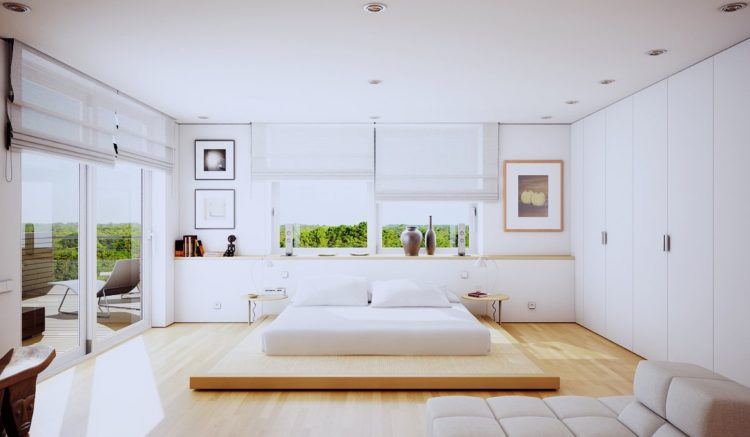 white bedroom with wooden platform