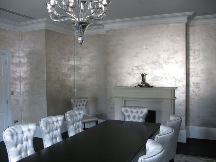 dining room with metallic wallpaper