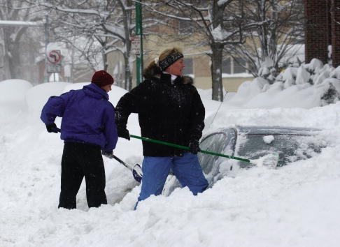 people shoveling snow in buffalo ny