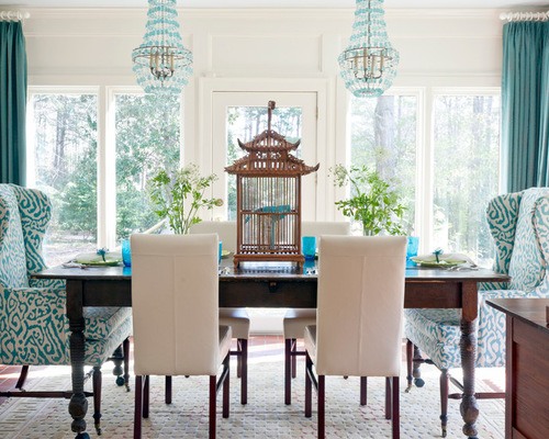 classy dining room with two hanging lamps