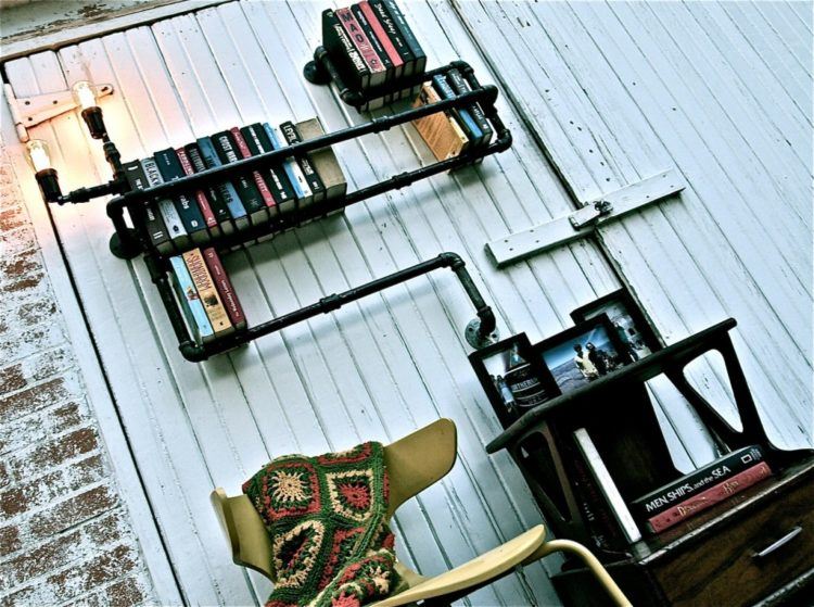 pipe shelving on white wall