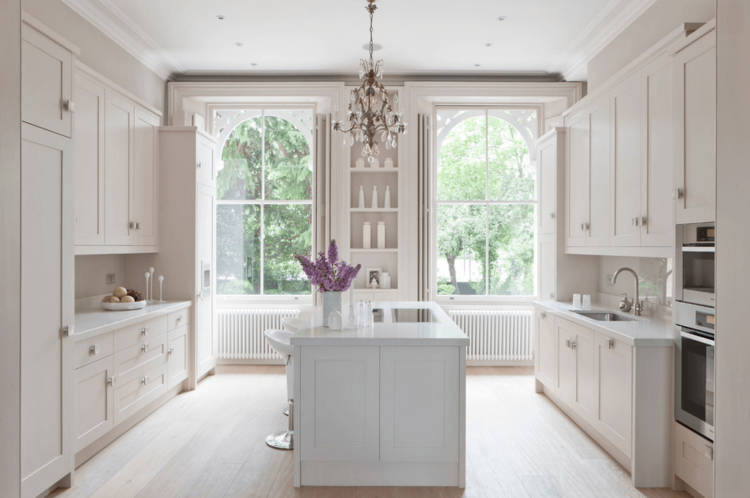 white kitchen with large windows