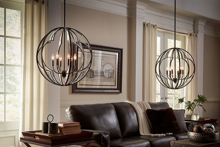 living room with unique hanging lamps