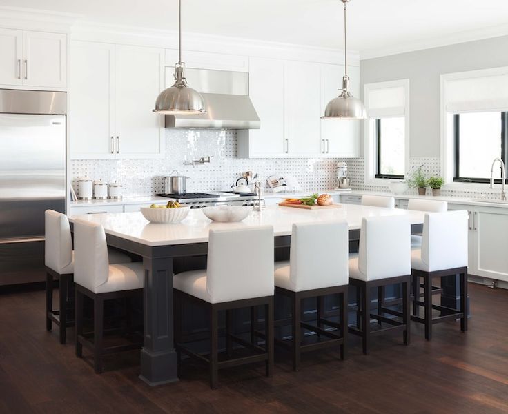 big table in the middle of kitchen