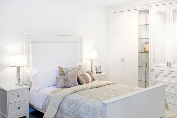 bedroom with white furniture