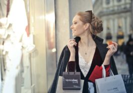 Woman Wearing Black Blazer Holding Shopping Bags