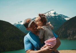 A Little Girl Giving her Dad a Kiss